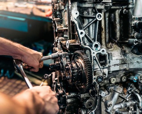 Professional mechanic repairing car small.jpg